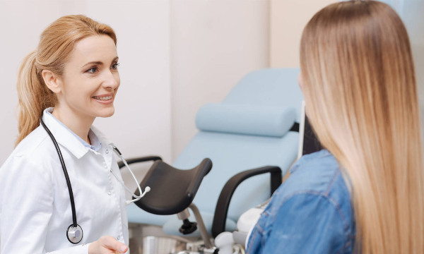 Conducting a colposcopy at the medical center 