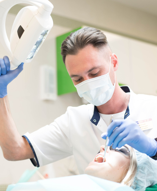 Dentist examining a patient