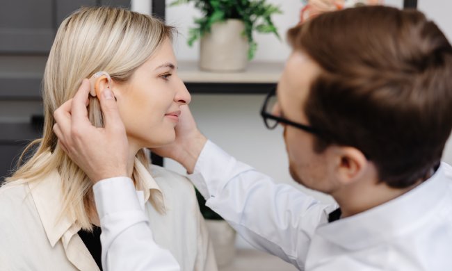 What is binaural hearing aid?